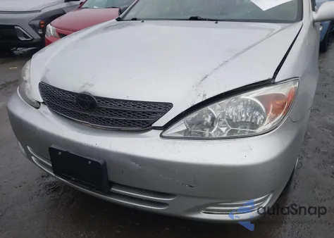 2002 Toyota Camry Le from USA, damaged, VIN 4T1BE32K92U011709